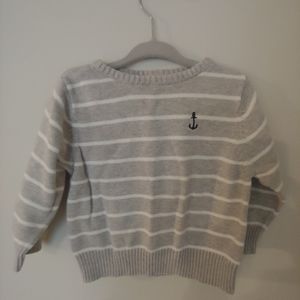 Striped sweater with navy anchor embroidery